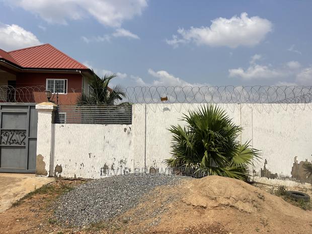 Walled Half Plot Plot of Land for Sale at Legon Hills · Photo 1