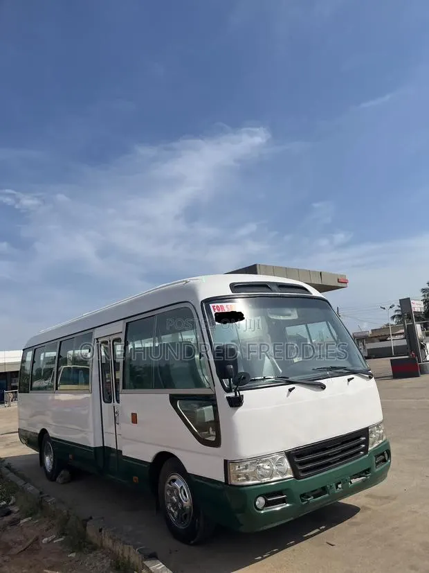 Toyota Coaster 2010 White · Photo 8