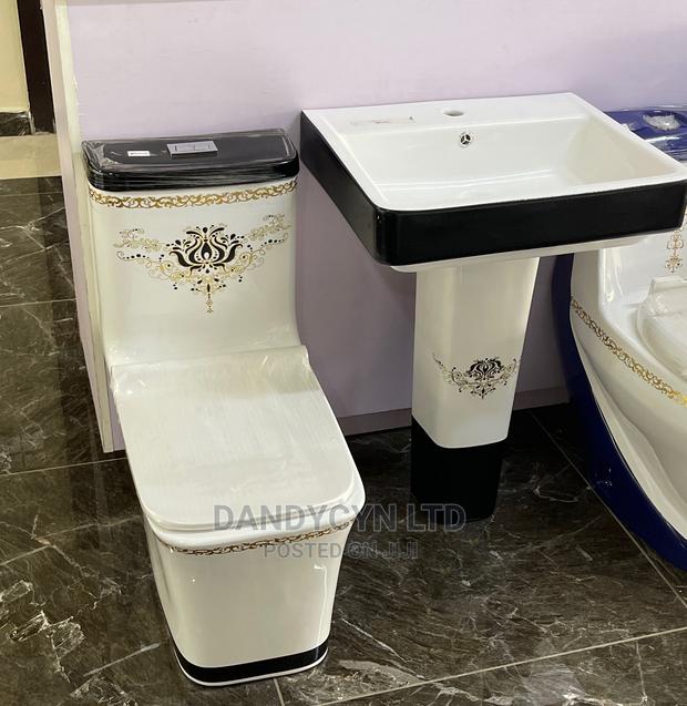 Water Closet With Wash Hand Basin · Photo 2