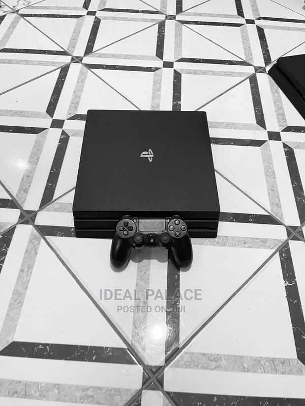 Black Ps4 Pro With 5 Games · Photo 2
