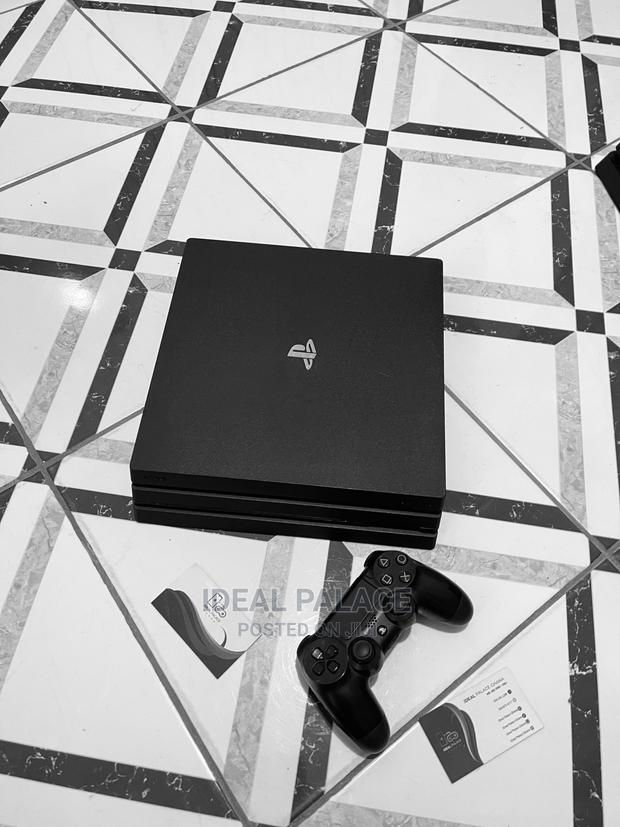 Black Ps4 Pro With 5 Games · Photo 1