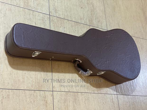 Yamaha Acoustic Guitar With Solid Leathercase · Photo 1