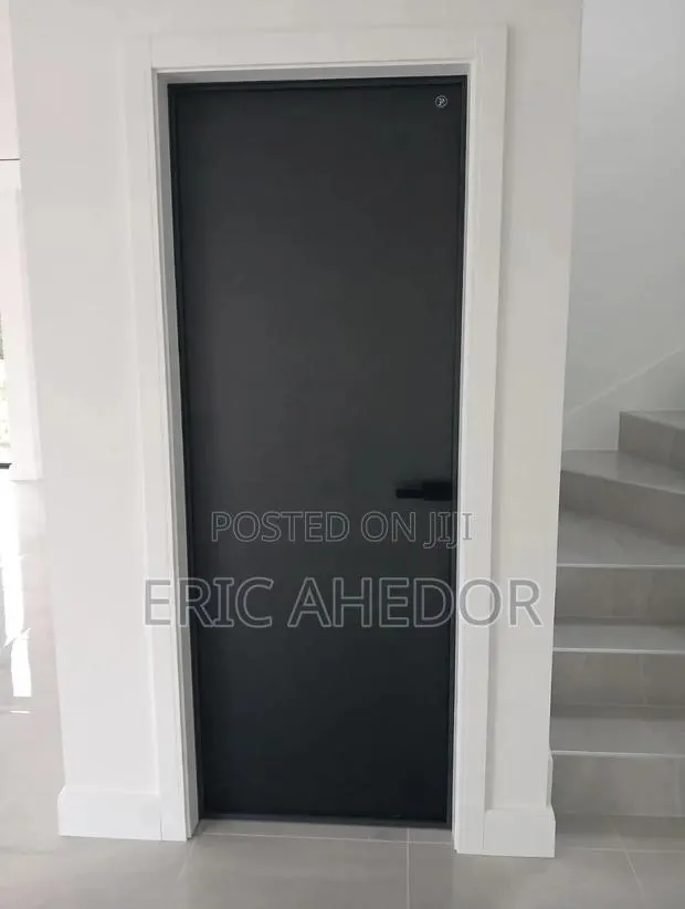 Heavy Newly Made Bathroom and Toilet Door and Handle · Photo 1