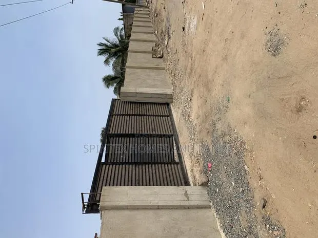 One Plot in Spintex Shell Signboard for Sale · Photo 1