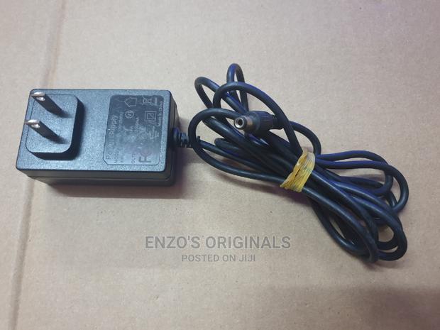 12V 2A Power Adapter or Charger for Digital Devices · Photo 2