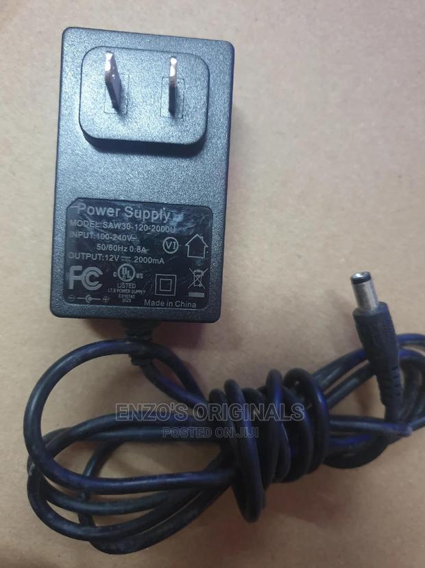 12V 2A Power Adapter or Charger for Digital Devices · Photo 1
