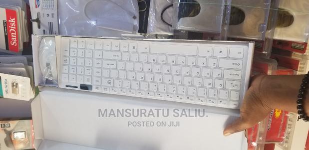 Universal Wireless Keyboard and Mouse · Photo 4