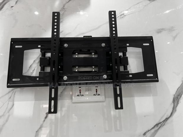Adjustable Wall Mount 32”-70” · Photo 1