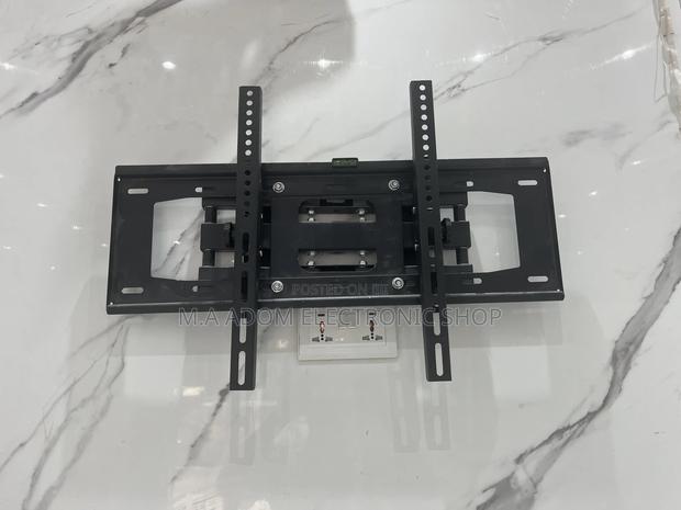 Wall Mount Suitable For Tv Between 32”-70” · Photo 1