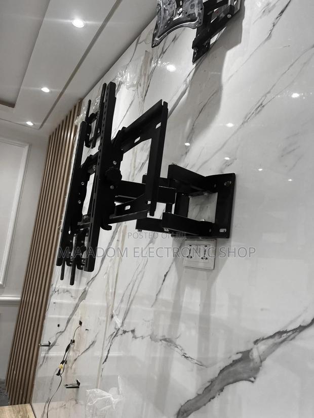 Full Motion Adjustable Bracket With Double Swivel 32”-70” · Photo 1