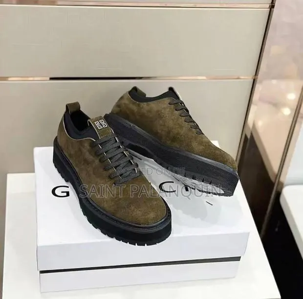 Pair of Olive Green With Chunky Black Lug Soles, Givenchy Details. · Photo 1