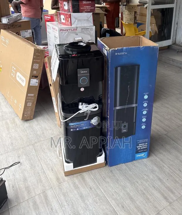 Refreshment Made Easy With Midea 16L Water Dispenser(Black). · Photo 1