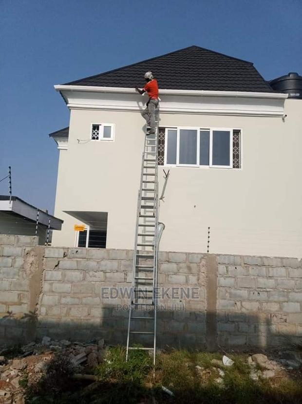 Installing Rain Gutters · Photo 1