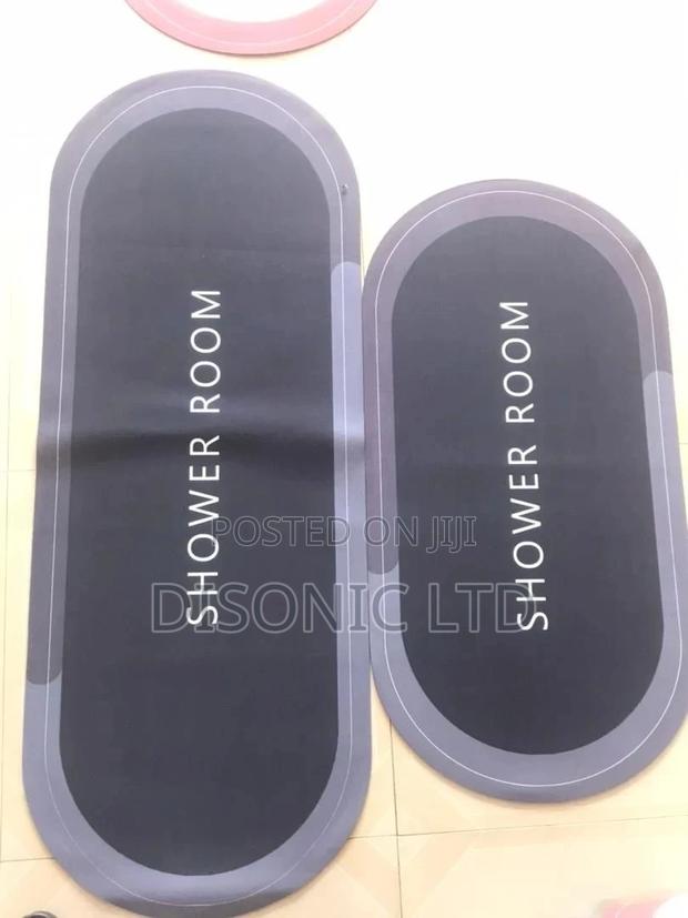 Water Absolvant Bathroom Door Mats · Photo 1