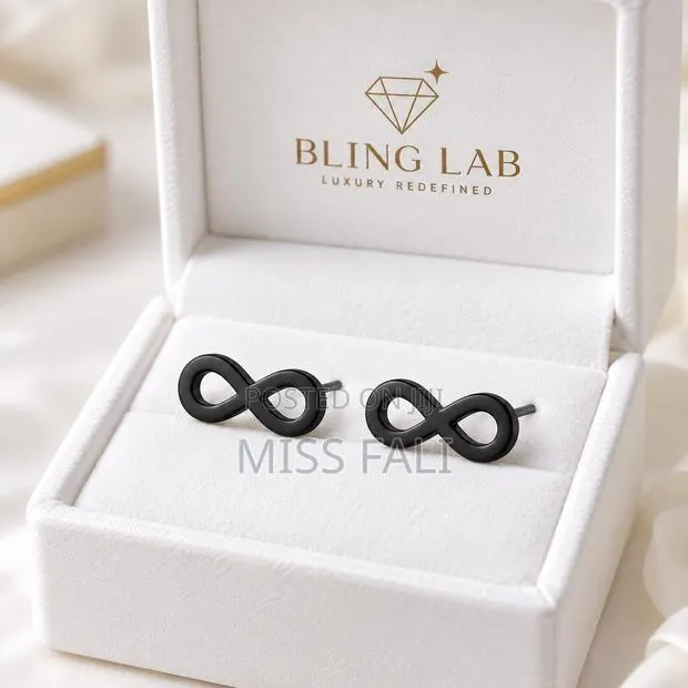 Infinity Stud Earrings · Photo 1