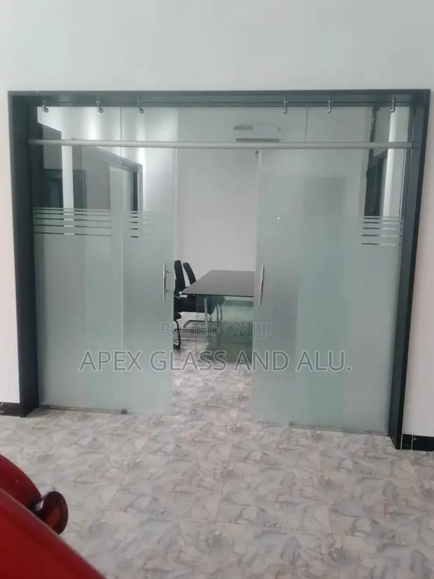 Frameless Manual Sliding Double Door · Photo 1