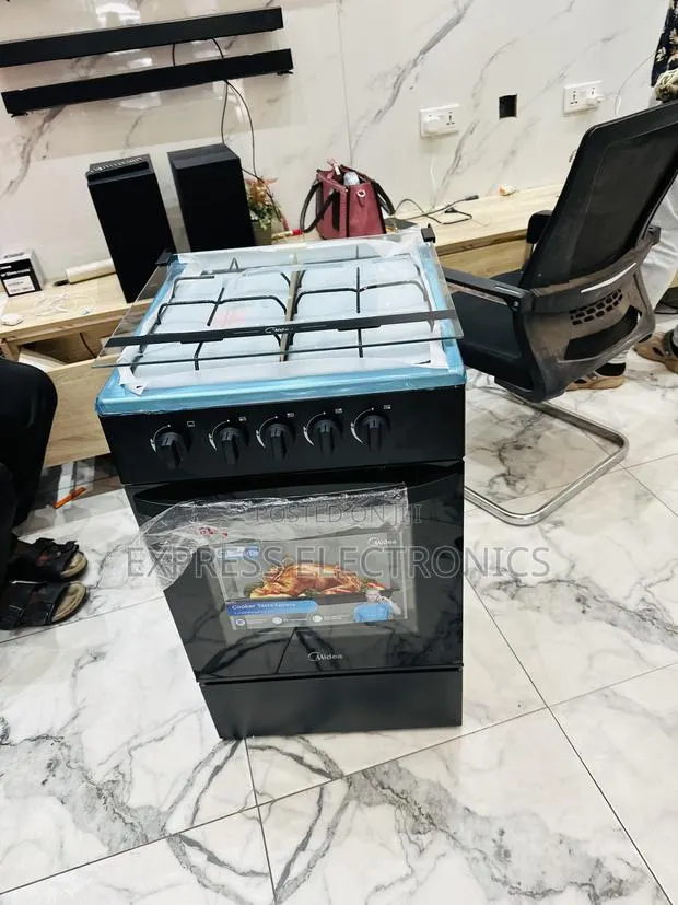 Limited Stock Black Gas Cooker Oven 4b 50/50 Midea · Photo 1