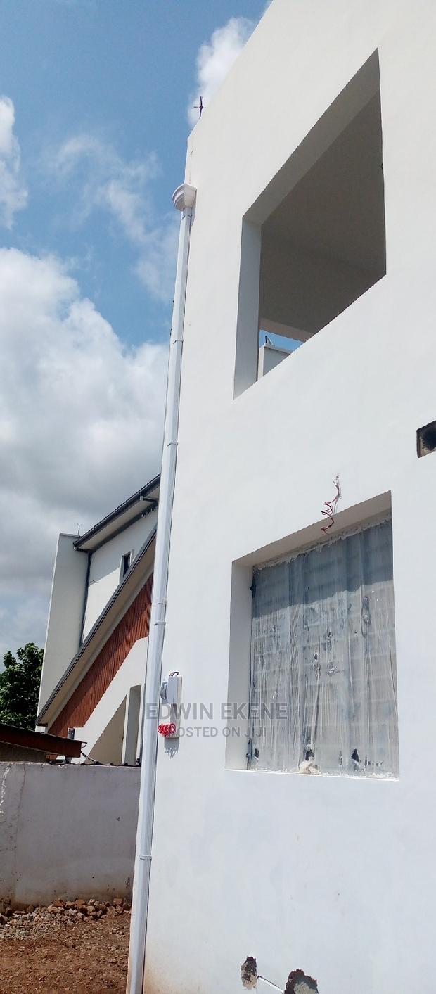 Down Pipe Installation · Photo 1