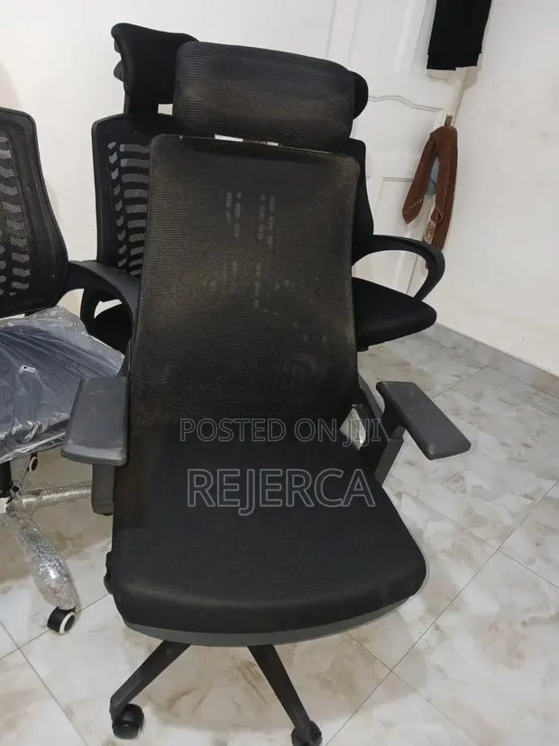 Office Swivel Chair With Head Rest · Photo 1