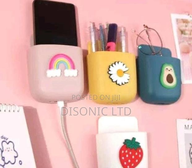 Phone and Tv Remote Holder · Photo 1