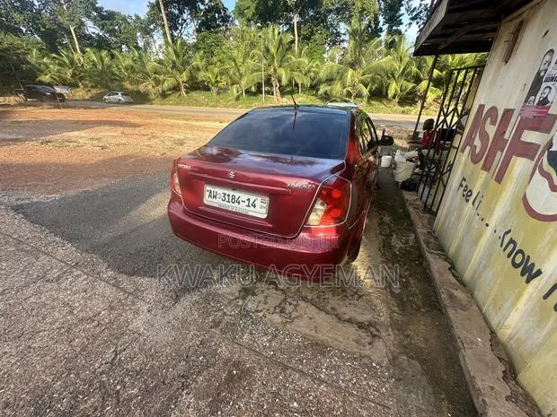 Suzuki Forenza 2010 Red · Photo 1