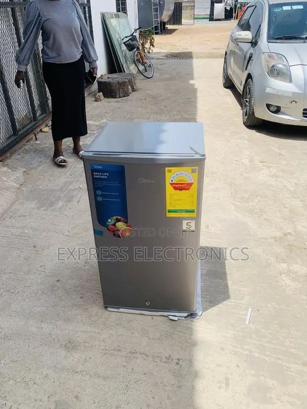 Text Us for Your Fridge Midea 93l · Photo 1