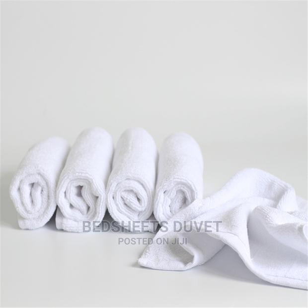 100% Cotton Face Towels · Photo 1