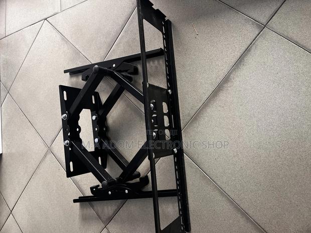 Tilting Adjustable Tv Mount 32”-70” · Photo 1