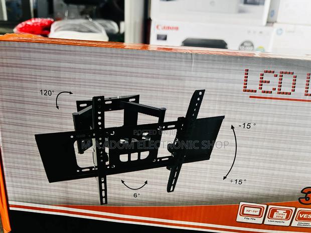 Mount Your Tv With Ease With This Flexible Wall Mount 32”-70 · Photo 1