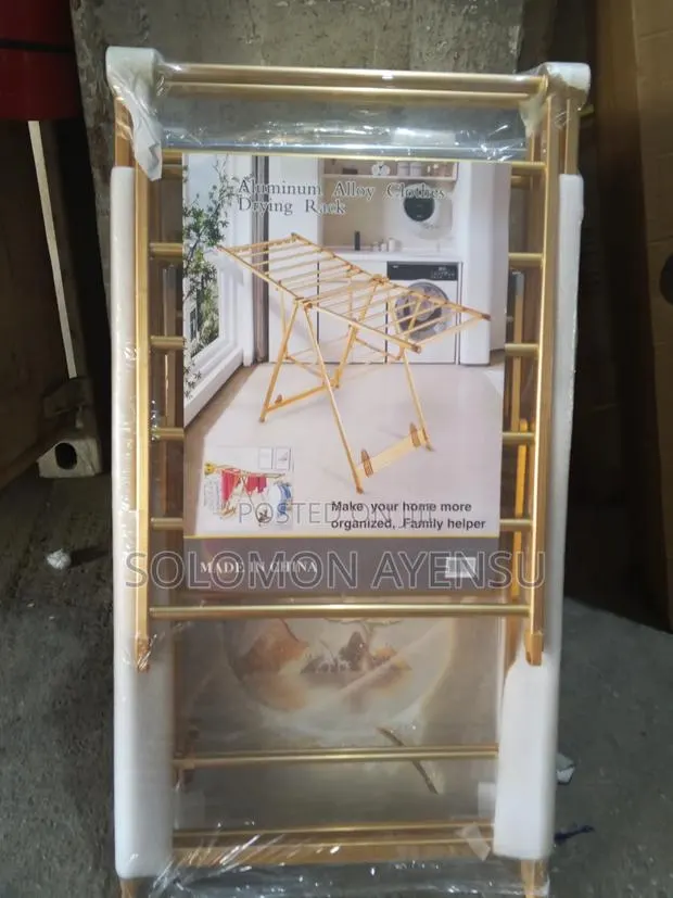 Foldable Gold Aluminum Alloy Clothes Drying Rack. · Photo 1