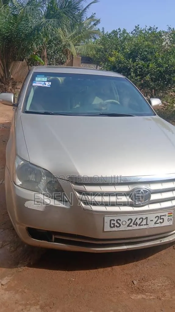Toyota Avalon XLS Sedan FWD (3.5L 6cyl 6A) 2009 Gold · Photo 1