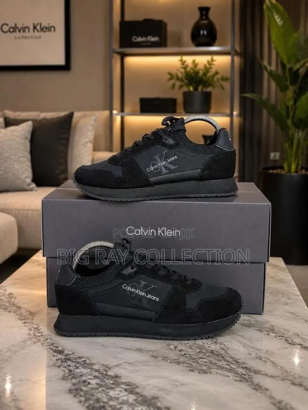 Classy Calvin Klein Sneaker Available in Two Colors · Photo 1