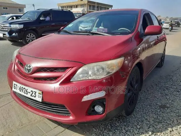 Toyota Corolla LE 4dr Sedan (1.8L 4cyl 4A) 2012 Red · Photo 1