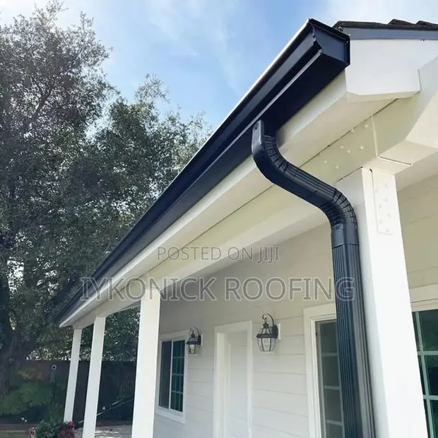 PVC Rain Gutter Downspout Installation · Photo 1