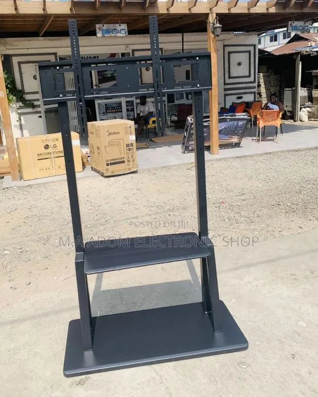 Heavy Duty Mobile Tv Stand With Wheels for 32-100”(Black). · Photo 1