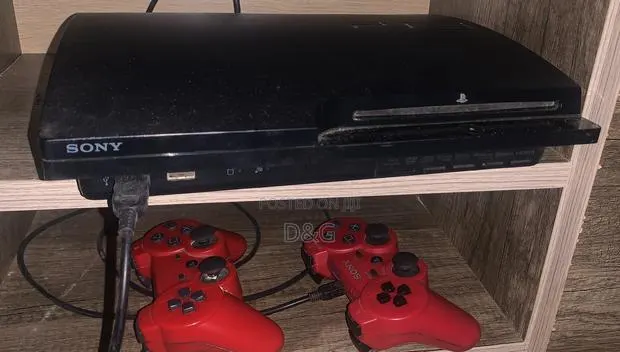 PS3 Slim Used With 8 Game · Photo 1