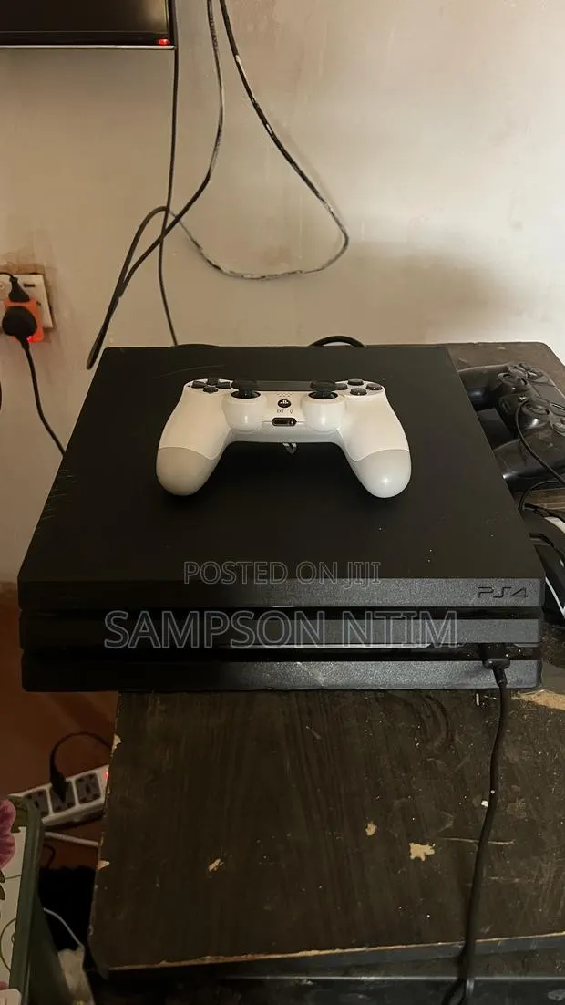 PS4 Pro With 17 Games, Includes FC26 ,The Last of Us and Many More · Photo 1