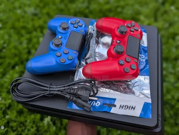 PS4 Slim With 2 Controllers and 7 Games of Your Choice · Photo 1