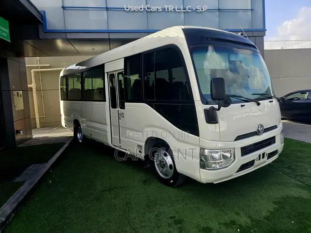 Toyota Coaster 2020 White · Photo 1