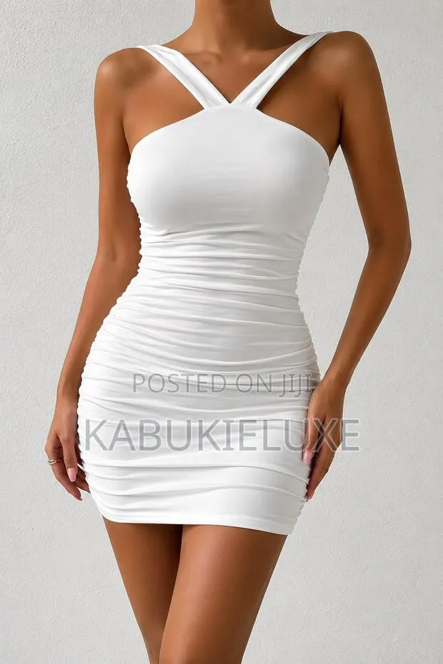 Elegant White Ruched Bodycon Mini Dress · Photo 1