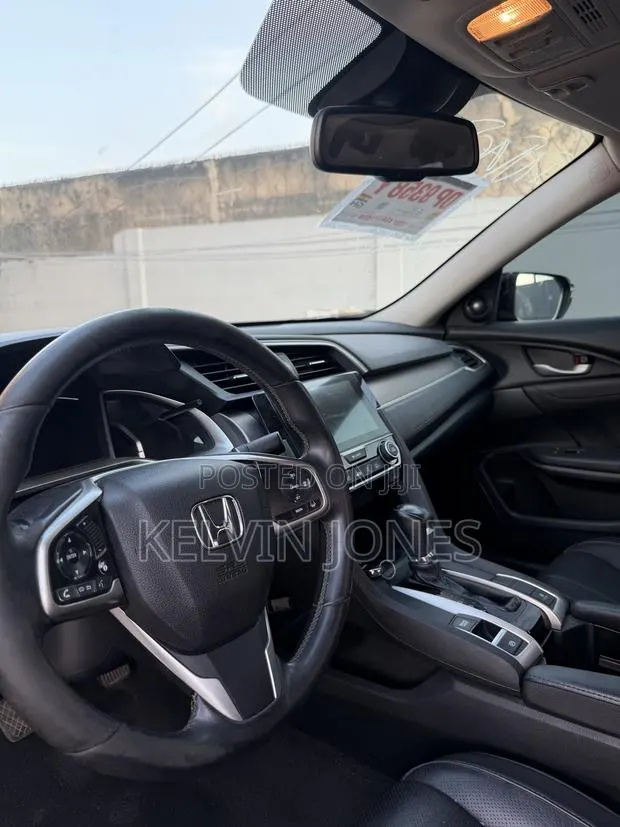 Honda Civic Touring 4dr Sedan (1.5L 4cyl) 2017 Black · Photo 1