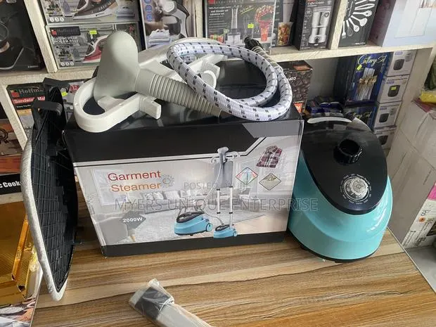 Stress Free Handheld Steam Iron With Stand · Photo 1