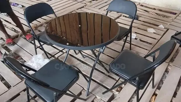 Folding Glass Metal Table With Chairs · Photo 1