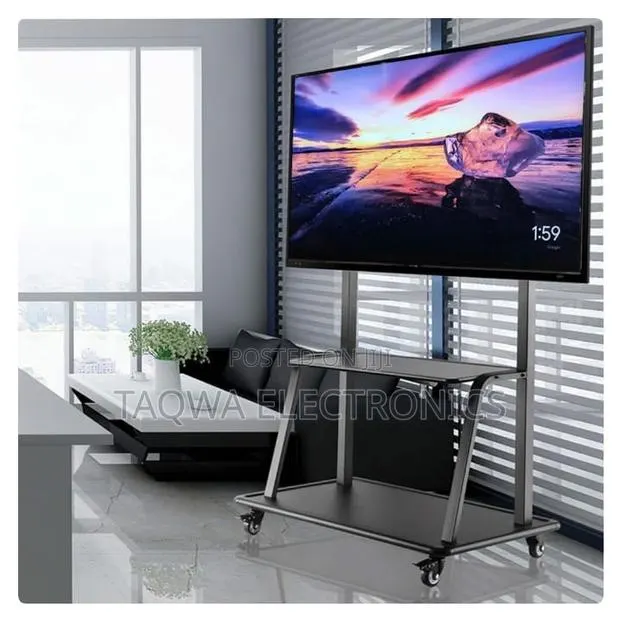Smooth and Adjustable 32 to 75 Inch Mobile Tv Trolley · Photo 1