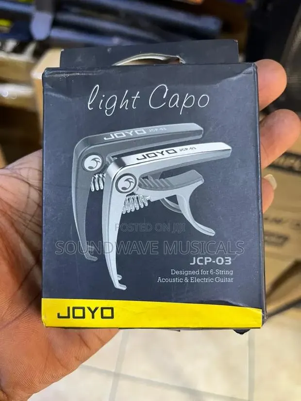 Guitar Capo Available · Photo 1