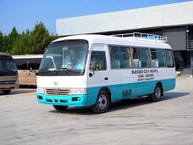Toyota Coaster 2021 White · Photo 1