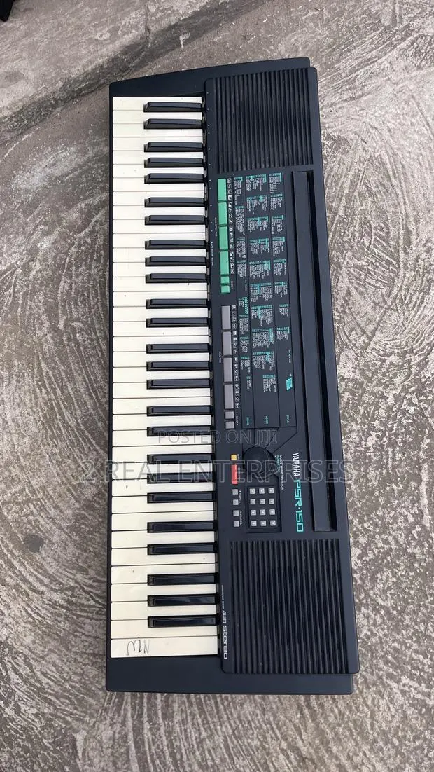 Yamaha PSR-150 Is a 61-Key Electronic Keyboard · Photo 1