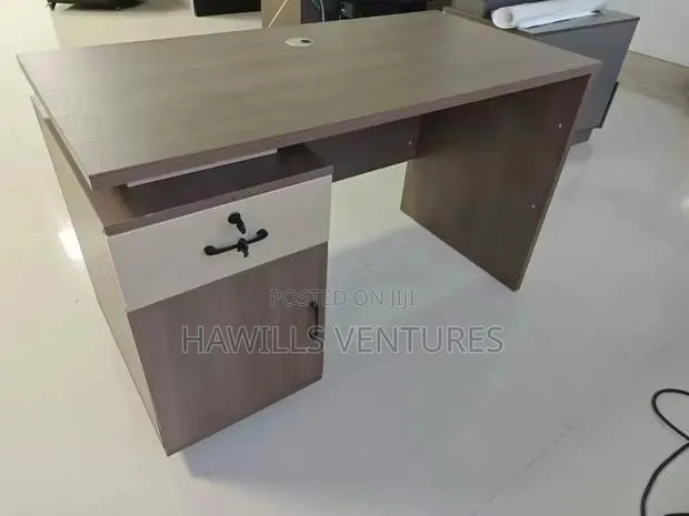 Wooden Office Desk Features a Large Workspace. · Photo 1