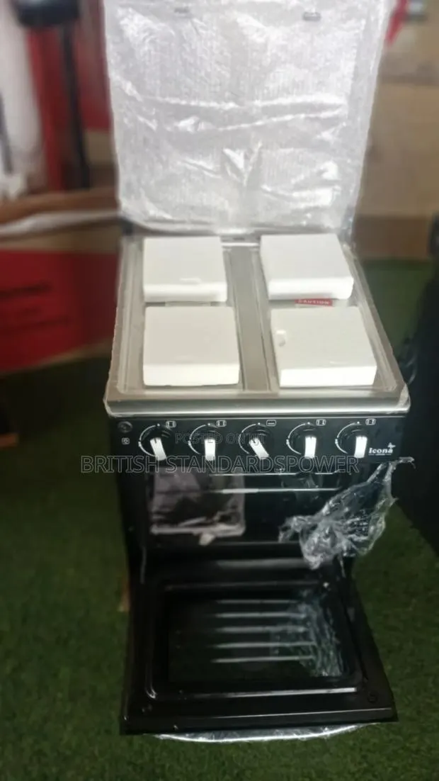 Stainless Steel 4 Burner Cooker With Oven · Photo 1
