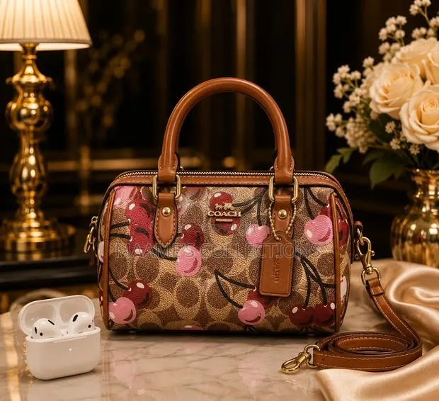 Coach Ladies Elegant Fashion HandBag With EarPod ( With EarPod) · Photo 1